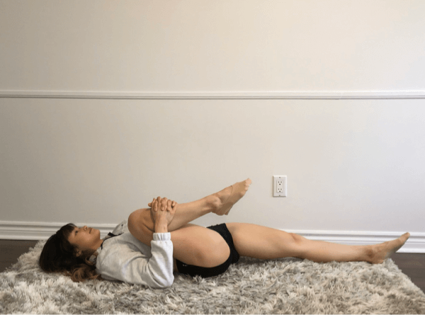 knee-to-chest stretch for tight hip flexors