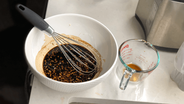 Mixing sauces for healthy beef and broccoli